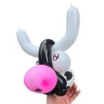 Balloon sculpture shaped like a cow's head.